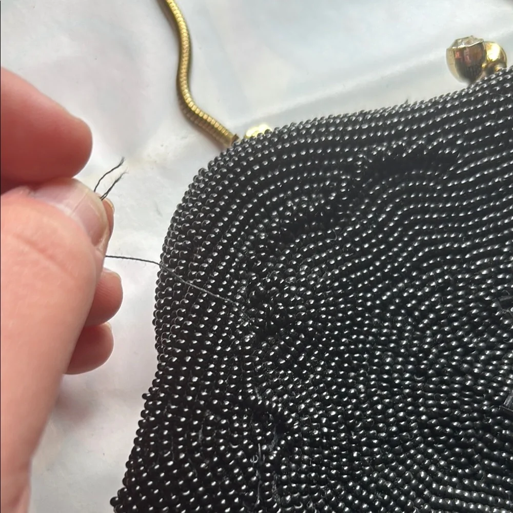 Black beaded purse with metal Clasp